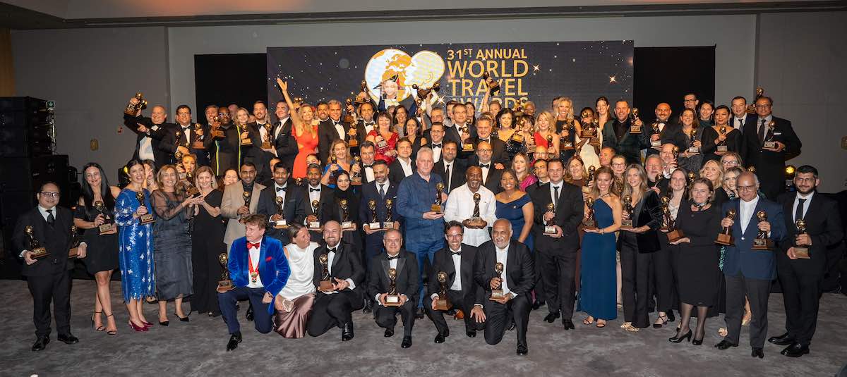 Winners of the World Travel Awards 2024 posing together at the gala ceremony.