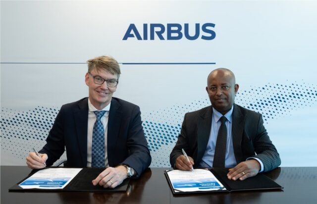 Laurent Negre, VP of Customer Services for Airbus Africa and Middle East, and Ato Retta Melaku, COO of Ethiopian Airlines, posing together.