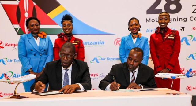 Kenya Airways CEO Allan Kilavuka of Kenya Airways and CEO Peter Ulanga of Air Tanzania ink MoU agreement in July 2025